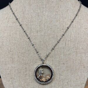 South Hill Design pendant with charms and long silver necklaces